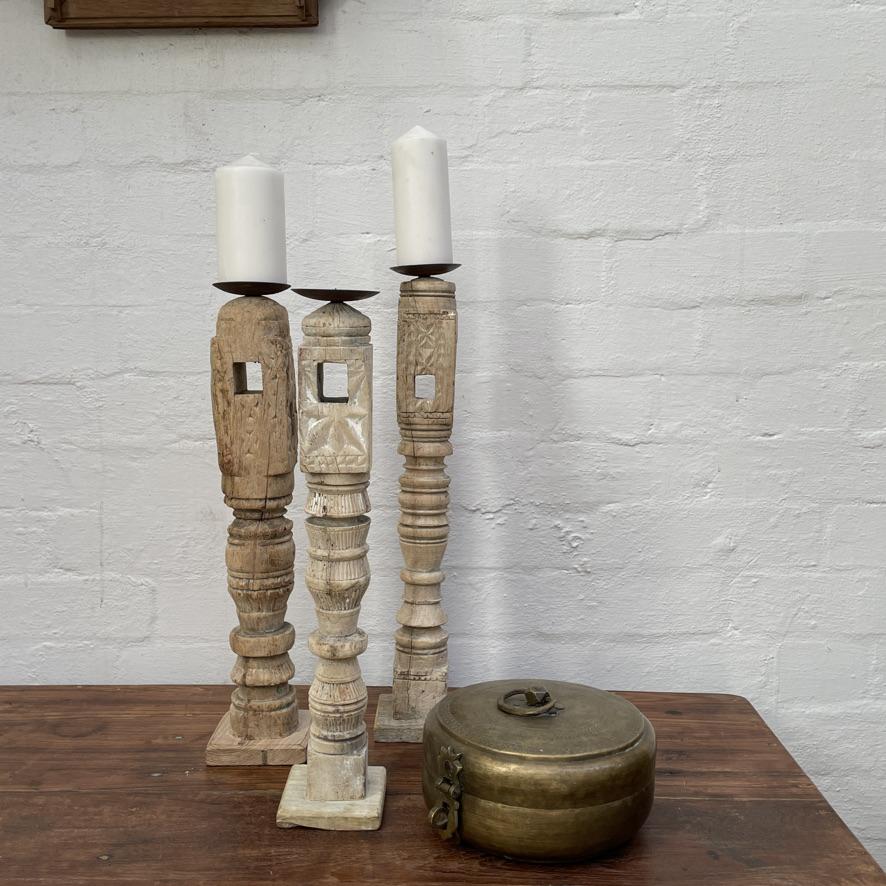 
                  
                    Tall carved candle stands
                  
                